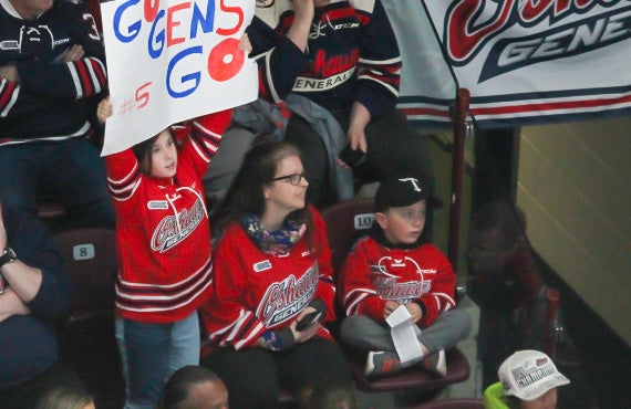 Generals fan cheering with a sign